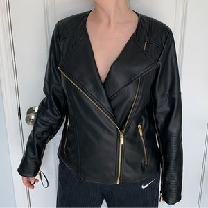 Calvin Klein vegan leather jacket with quilted shoulder detail and zipper cuffs
